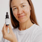 Laponie Calming Serum held by model