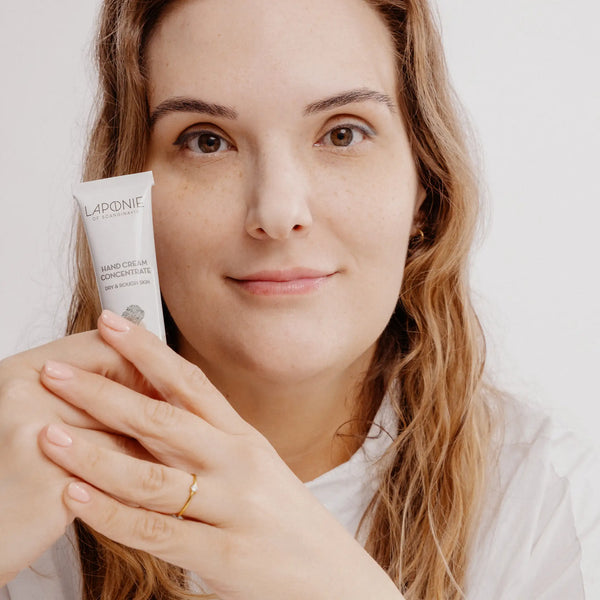 Laponie Hand Cream Concentrate held by model